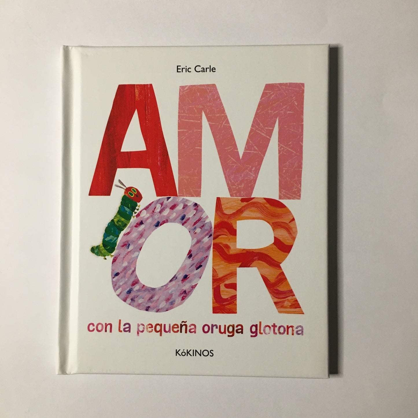 Amor, con la pequeña oruga glotona